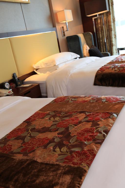 Guangzhou Changfeng Gloria Plaza Hotel Rum bild