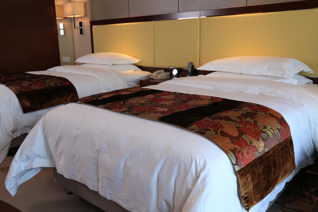 Guangzhou Changfeng Gloria Plaza Hotel Rum bild